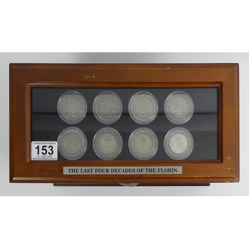 153 - A coin collectors cabinet containing four decades of Florins, 1930 - 1967.