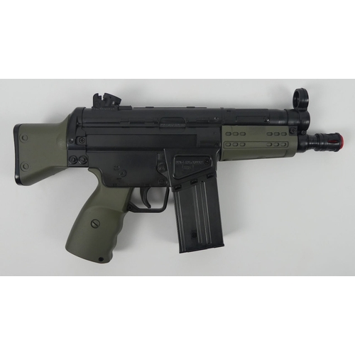 201 - Mini G3 A3 full automatic assault rifle, electric operated air soft gun, boxed, 30cm.
No licence is ... 