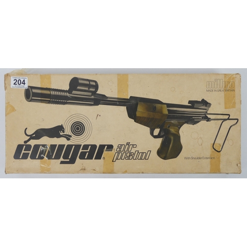 204 - Milbro Cougar air pistol with shoulder extension, boxed, 47cm.
No licence is required to purchase th... 