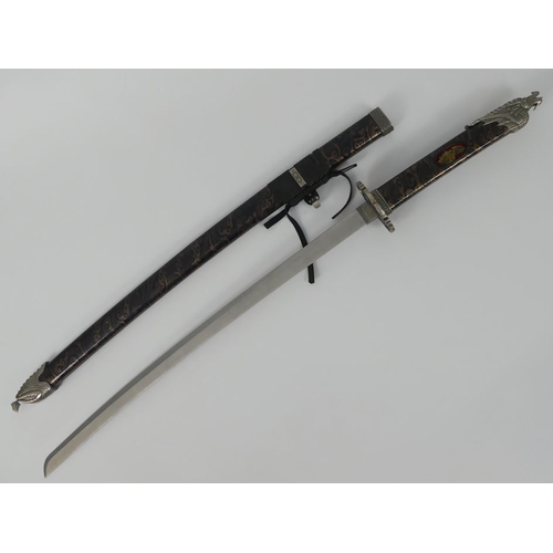 250 - 20th century Japanes Katana with an etched blade, the scabbard with white metal mounts. Blade L65cm