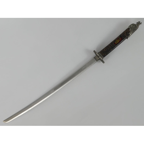 250 - 20th century Japanes Katana with an etched blade, the scabbard with white metal mounts. Blade L65cm