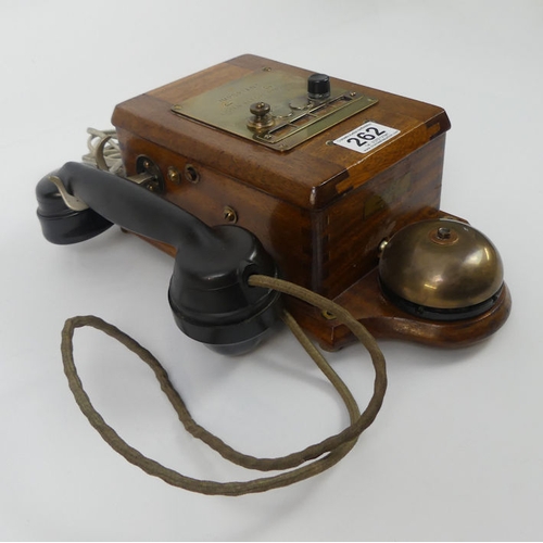 262 - A vintage GER wall mounted telephone, 31cm x 23cm.