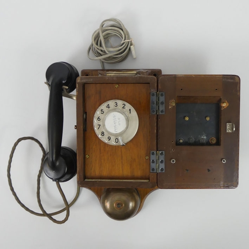 262 - A vintage GER wall mounted telephone, 31cm x 23cm.