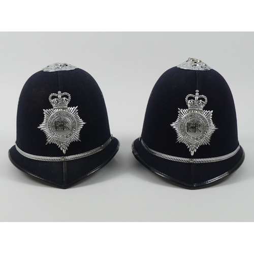 263 - Two Hertfordshire Constabulary Police helmets, 20cm x 22cm.