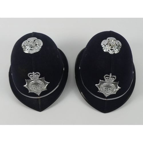 263 - Two Hertfordshire Constabulary Police helmets, 20cm x 22cm.