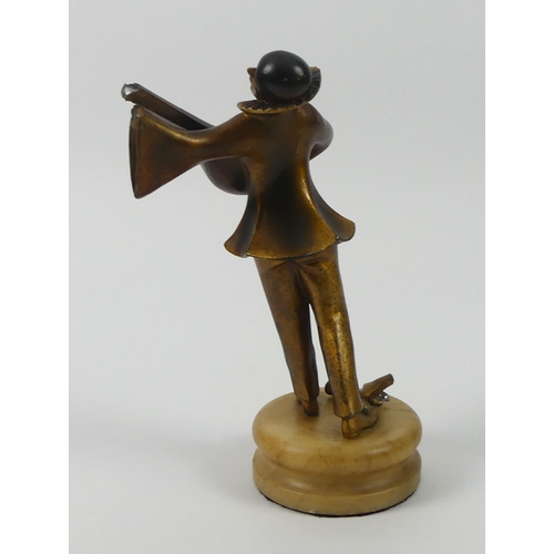 264 - An Art Deco gilt metal figure of a mandolin player on an onyx base, 24cm.