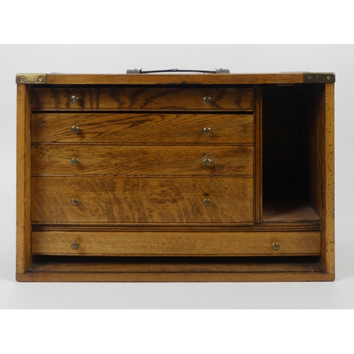 268 - An Oak  five drawer collectors cabinet with brass handles and mounts, 32cm x 52cm.