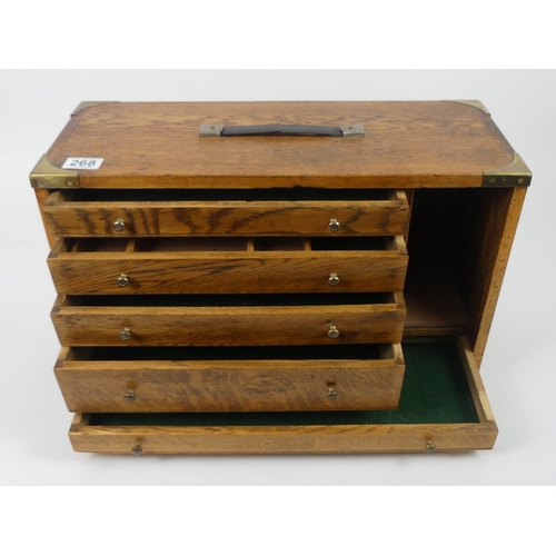 268 - An Oak  five drawer collectors cabinet with brass handles and mounts, 32cm x 52cm.