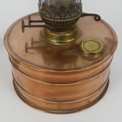 273 - Brass column lamp base together with a copper and brass oil lamp, highest 53cm.