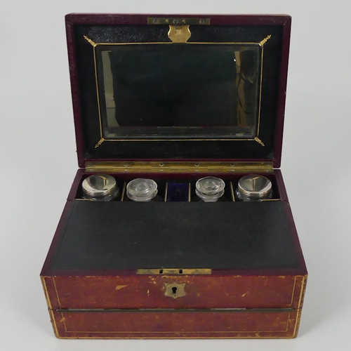 277 - Late 19th century leather ladies vanity box opening to reveal fitted compartments with perfume bottl... 