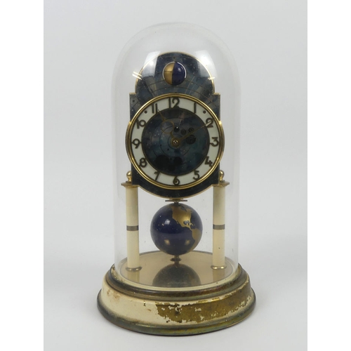 282 - A glass dome covered anniversary time clock with zodiac dial and world globe pendulum by Kaiser, 27c... 