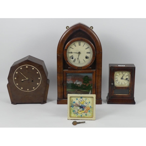 283 - Four clocks, including an America wall clock and a  Donald Duck alarm clock, highest 47cm x 26cm