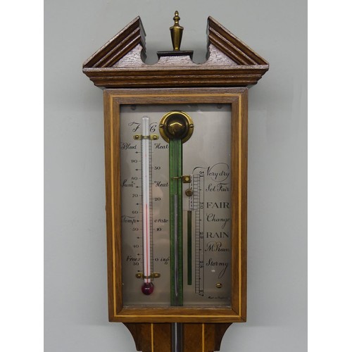 270 - A 20th century mahogany inlaid stick barometer, 97cm.