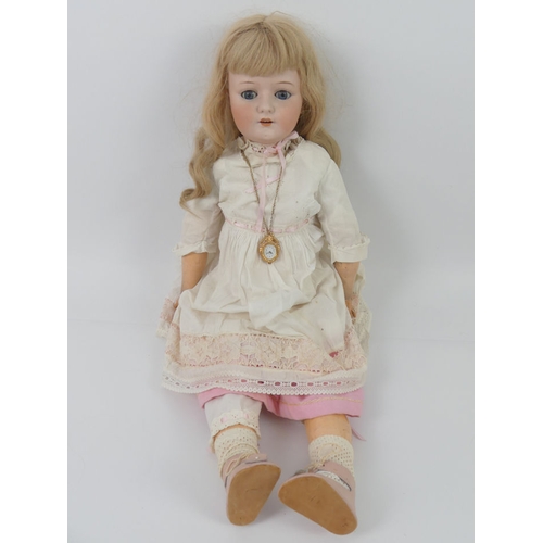 326 - Heubach Koppelsdorf bisque headed doll 250-9 with impressed marks to head, 76cm.