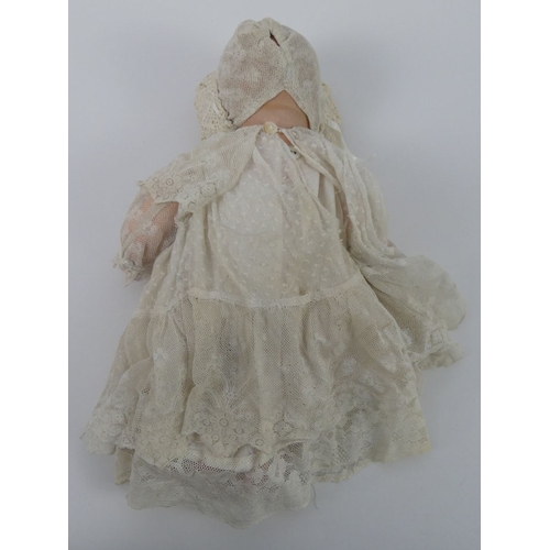 329 - Armand Marseille bisque headed sleeping doll 351, with impressed marks to head, 40cm.