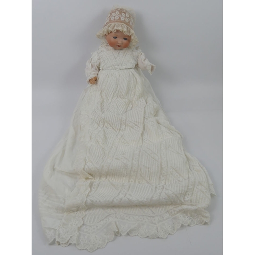 334 - Armand Marseille bisque headed doll 351 with composition body and impressed marks to head, L58cm