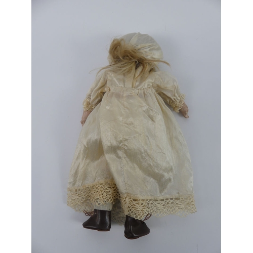 338 - Gebruder Knoch bisque headed doll 215, impressed marks to head, 41cm.