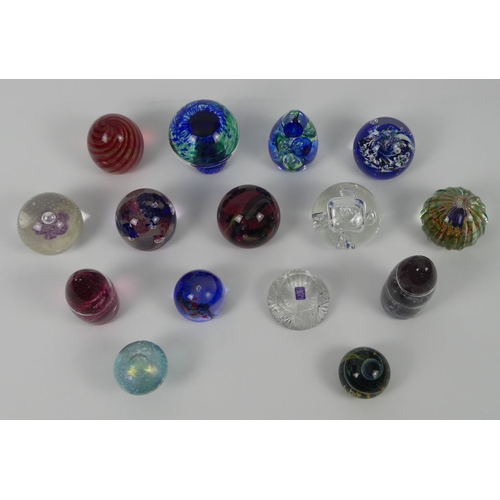 363 - Fifteen glass paperweights including Wedgwood, Mdina and Caithness.