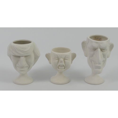 374 - Three Fluck & Law pottery Spitting Image Royal egg cups. H11cm