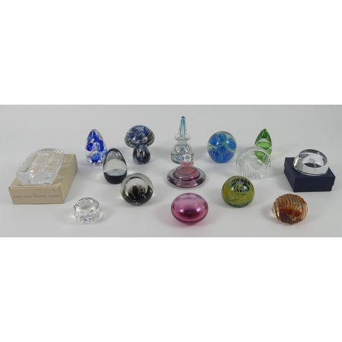 382 - Twenty glass paperweights including a Perthshire scent bottle, Caithness and Mdina.