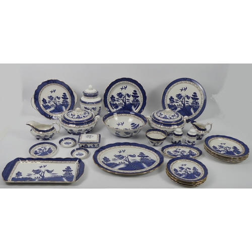 385 - Twenty-nine pieces of Royal Doulton Booths Willow Pattern table ware, including tureens, bowls, plat... 