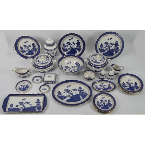 385 - Twenty-nine pieces of Royal Doulton Booths Willow Pattern table ware, including tureens, bowls, plat... 