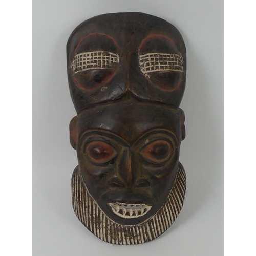 443 - Cameron carved African tribal mask. 39 x 18 cm.