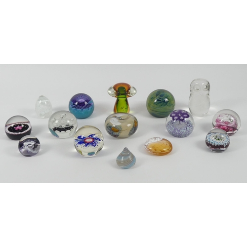 368 - Fifteen glass paperweights including Caithness, Langham, Mdina and Selkirk. Largest 12 cm high.