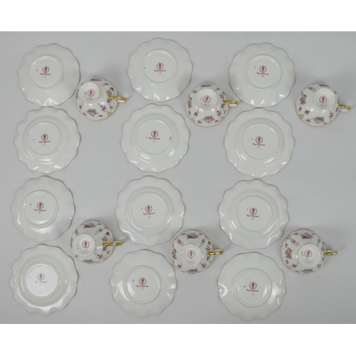 389 - Six Royal Crown Derby cups, saucers and side plates in the Marie Antoinette pattern. H8cm