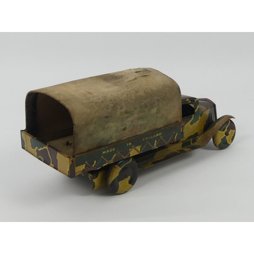 398 - A Mettoy clockwork tinplate army truck from the 1950's. 26 x 12 cm.