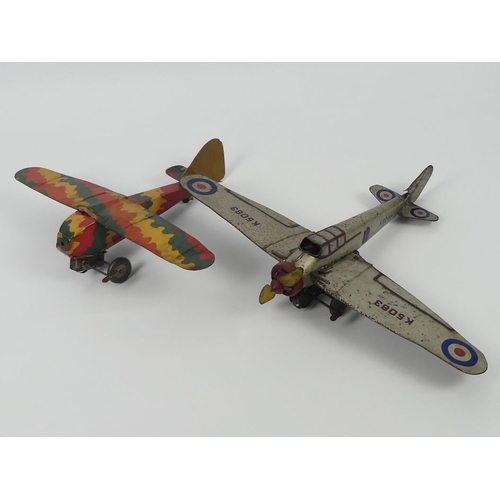 399 - A Mettoy clockwork tinplate RAF monoplane K5083 together with a Mettoy clockwork bi-plane. H14cm X W... 