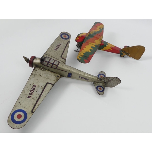 399 - A Mettoy clockwork tinplate RAF monoplane K5083 together with a Mettoy clockwork bi-plane. H14cm X W... 