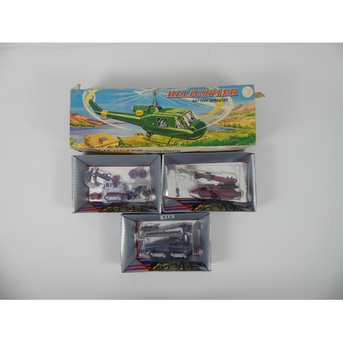 415 - A boxed Mic battery operated helicopter together with three multiimac generation II crane trucks.