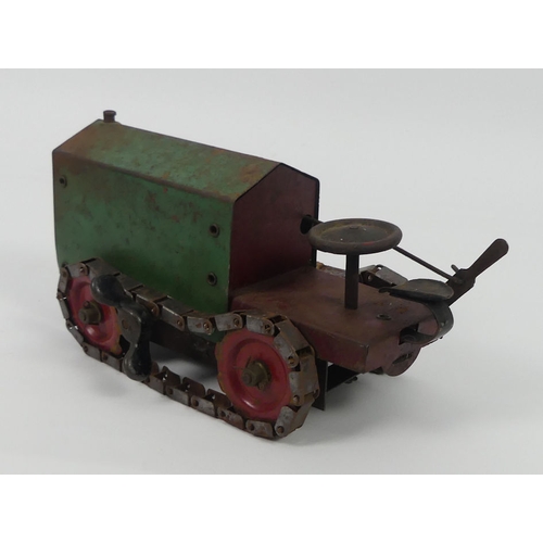 433 - A 1920's tinplate Structo Toys clockwork construction kit model 44 tractor bulldozer.