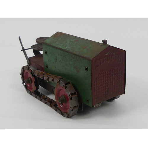 433 - A 1920's tinplate Structo Toys clockwork construction kit model 44 tractor bulldozer.