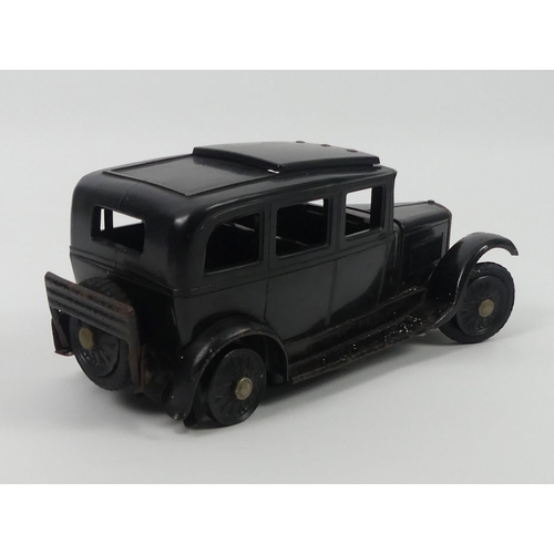 436 - A scarce Bakelite Austin British 1930's sliding roof  clockwork car by Ranlite. 11 x 26 cm.