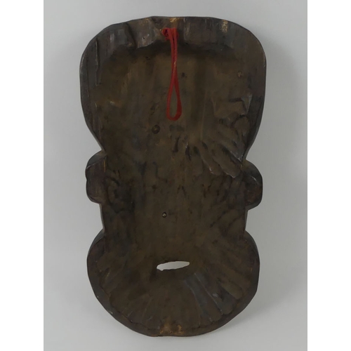 443 - Cameron carved African tribal mask. 39 x 18 cm.