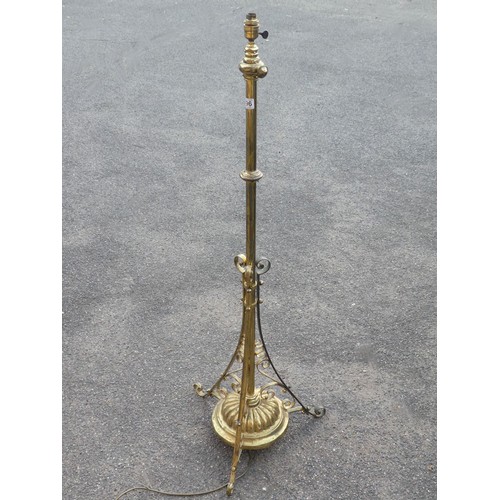 496 - A brass telescopic standard lamp, 133cm.  Collection/Own Courier Only.