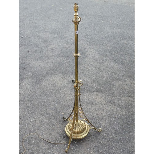 496 - A brass telescopic standard lamp, 133cm.  Collection/Own Courier Only.