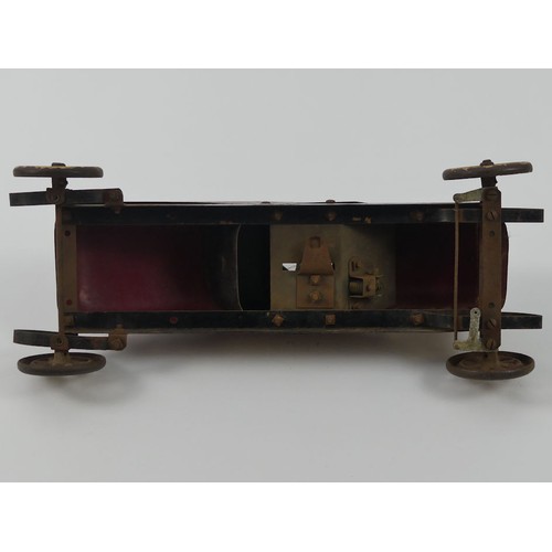 397 - A 1920's tinplate Structo Toys clockwork construction kit American racing car. 38 x 12 cm.