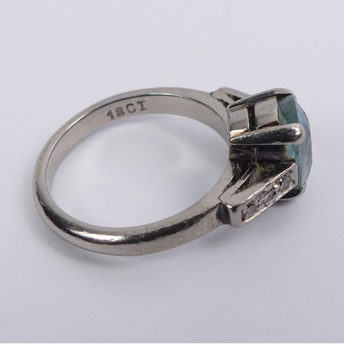 32 - 18ct white gold, aquamarine ring set with diamonds to the shoulders, 4.9 grams, 8.8mm, size I 1/2.