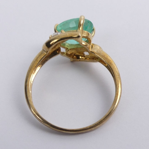 40 - 9ct gold, emerald and diamond ring, (emerald approximately 1.5ct), 2.7 grams, 11mm, size M.