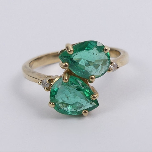 42 - 9ct gold, pear shaped emerald two stone ring with diamond shoulders, 2.6 grams, 12.3mm, size M.