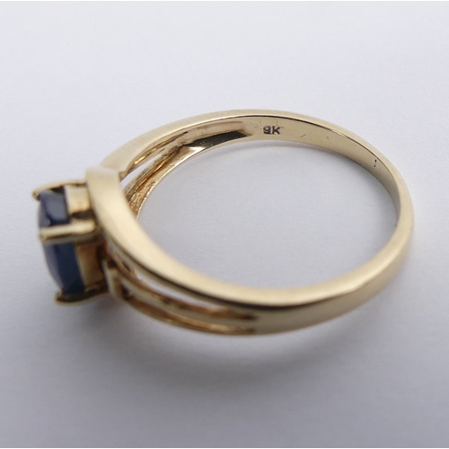 43 - 9ct gold sapphire single stone ring, 2 grams, 8mm, size M.