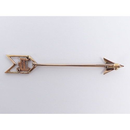 12 - 9ct gold enamel and diamond arrow brooch, 3 grams, 65mm.