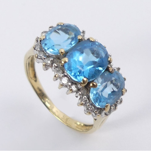 13 - 9ct gold, blue topaz and diamond ring, 3 grams, 11mm, size L 1/2.