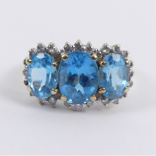 13 - 9ct gold, blue topaz and diamond ring, 3 grams, 11mm, size L 1/2.