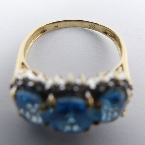 13 - 9ct gold, blue topaz and diamond ring, 3 grams, 11mm, size L 1/2.