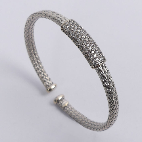 20 - 18ct white gold woven design diamond set cuff bangle, 18 grams, 7.8mm.