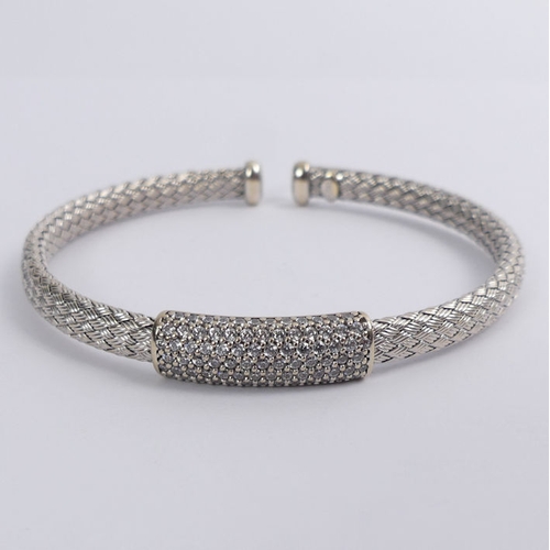 20 - 18ct white gold woven design diamond set cuff bangle, 18 grams, 7.8mm.